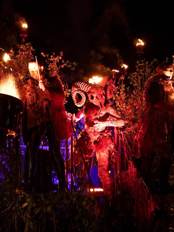 Fiery Halloween parade with drummers and a horned figure at Dublin’s Bram Stoker Festival.
