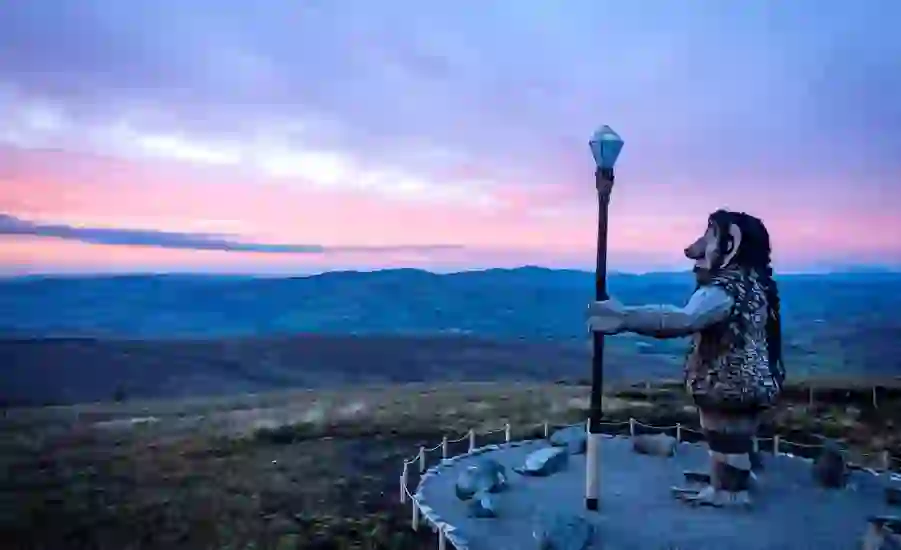 The Sperrins Giant sculpture overlooks the Sperrin Mountains at sunset in County Tyrone.