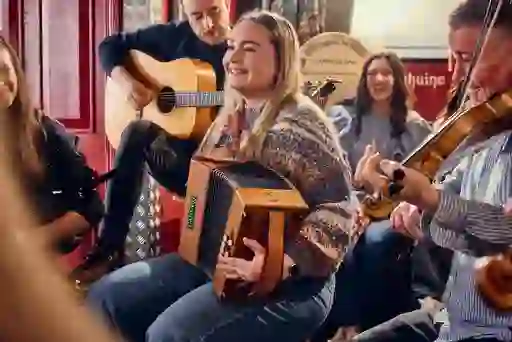 Traditional music players in Madden's Bar in Belfast city, performing for punters.