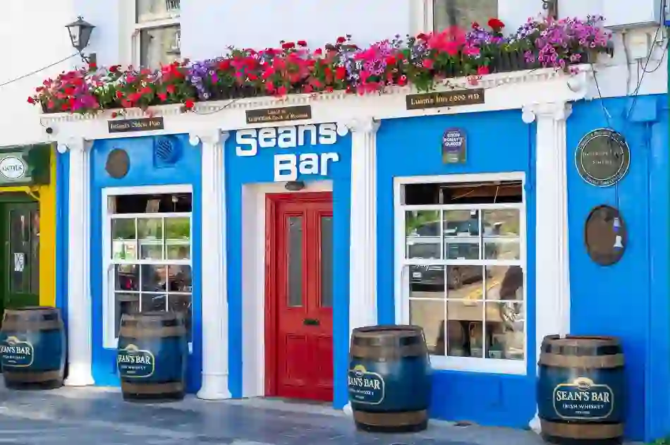 Sean's Bar in Athlone, County Westmeath, recognised as one of Ireland's oldest pubs and adorned with colourful flowers.