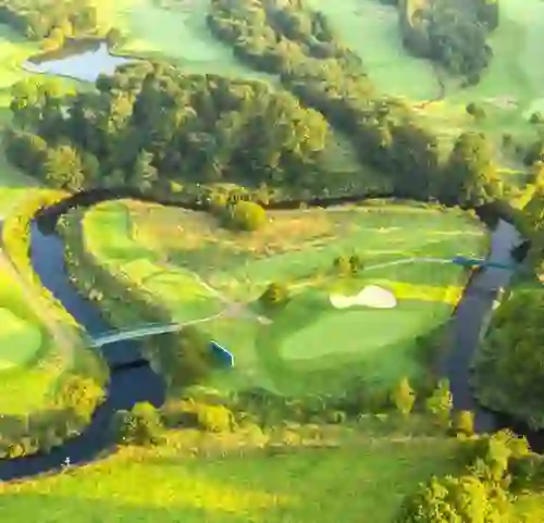 Aerial view of Galgorm Castle Golf Club in County Antrim with river and parkland fairways.