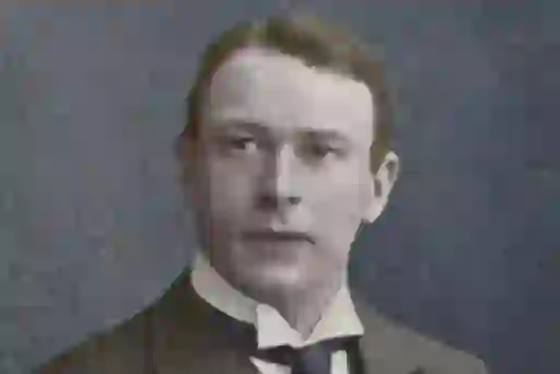 Portrait of Titanic’s chief designer Thomas Andrews, wearing a suit and tie.