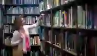 Woman at the Linen library